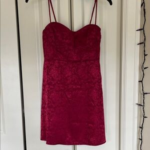 Elegant red dress with a floral design